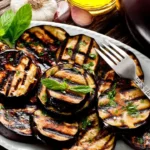 Non condire le melanzane grigliate solo con olio e sale: ecco 5 idee per renderle eccezionali